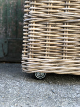 Load image into Gallery viewer, Medium Lined Cane Basket on Wheels
